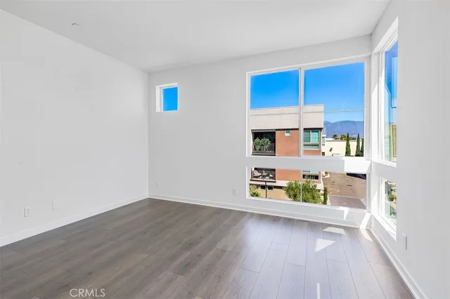 a view of kitchen with wooden floor