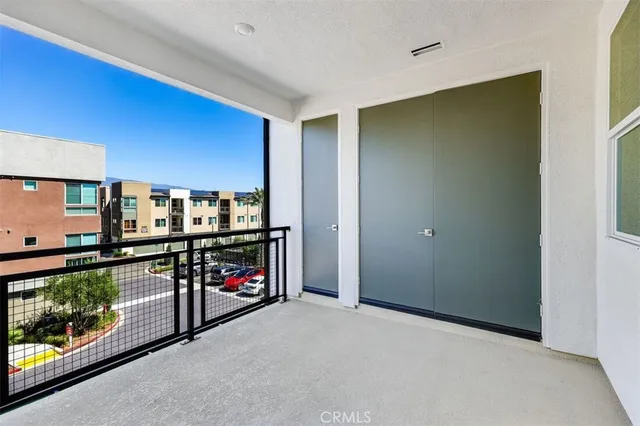 a view of a livingroom with furniture and staircase