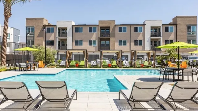 a view of a chairs and table in the patio