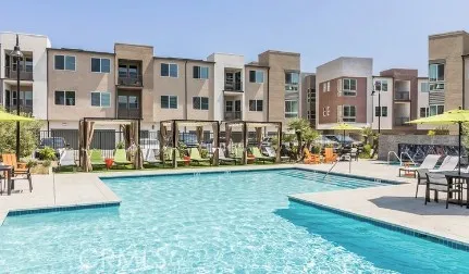 a view of pool with outdoor seating