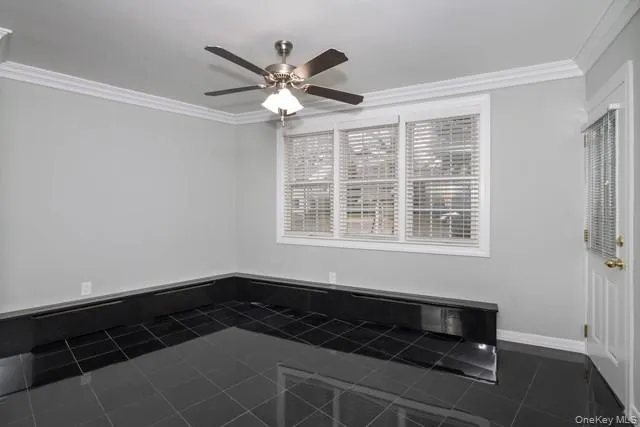 a view of a livingroom with a workspace