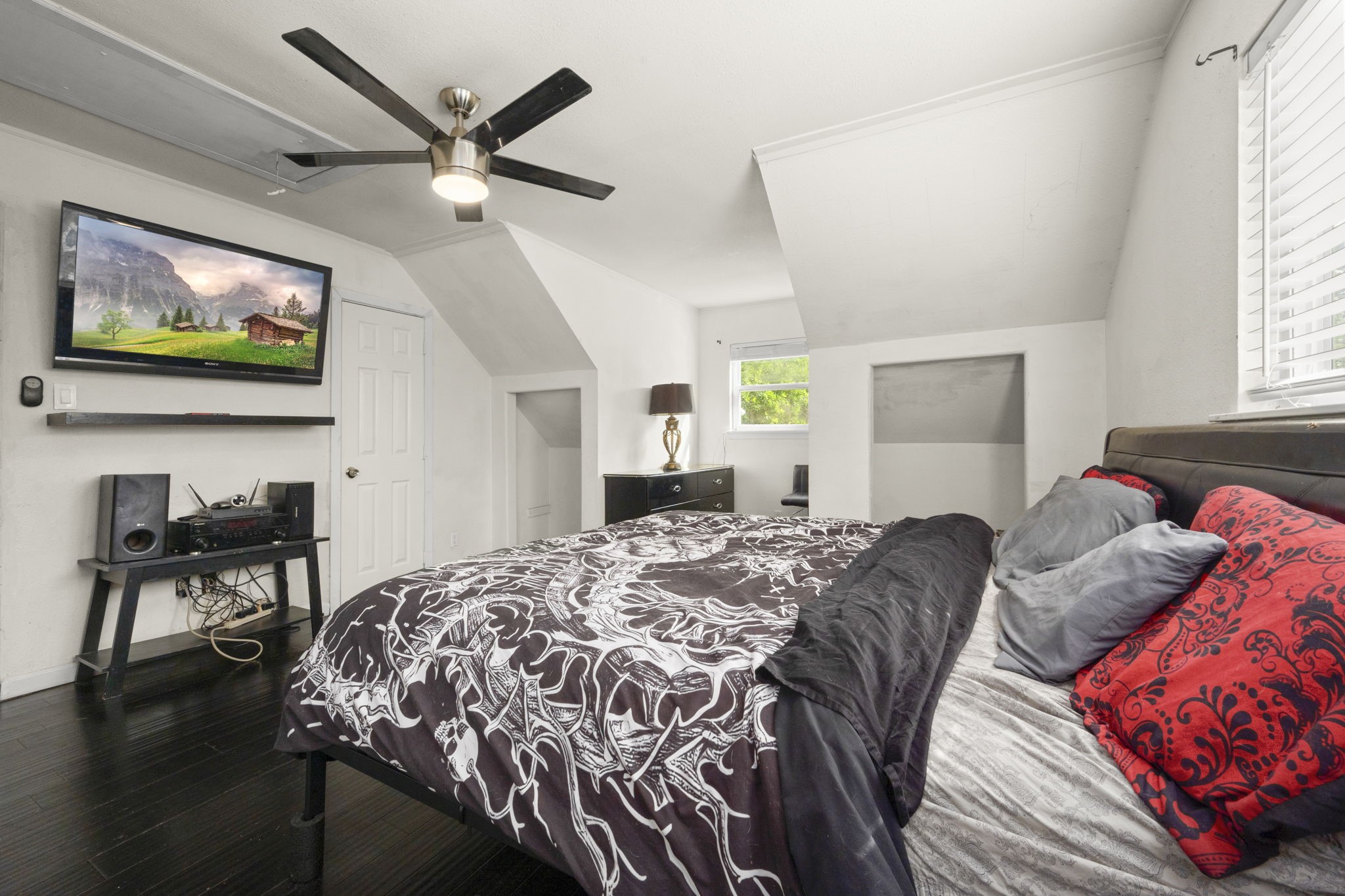 3414 Rustling Pines Street Spring, TX 77380 - Photo 19 of 26 a bedroom with a bed and a flat screen tv