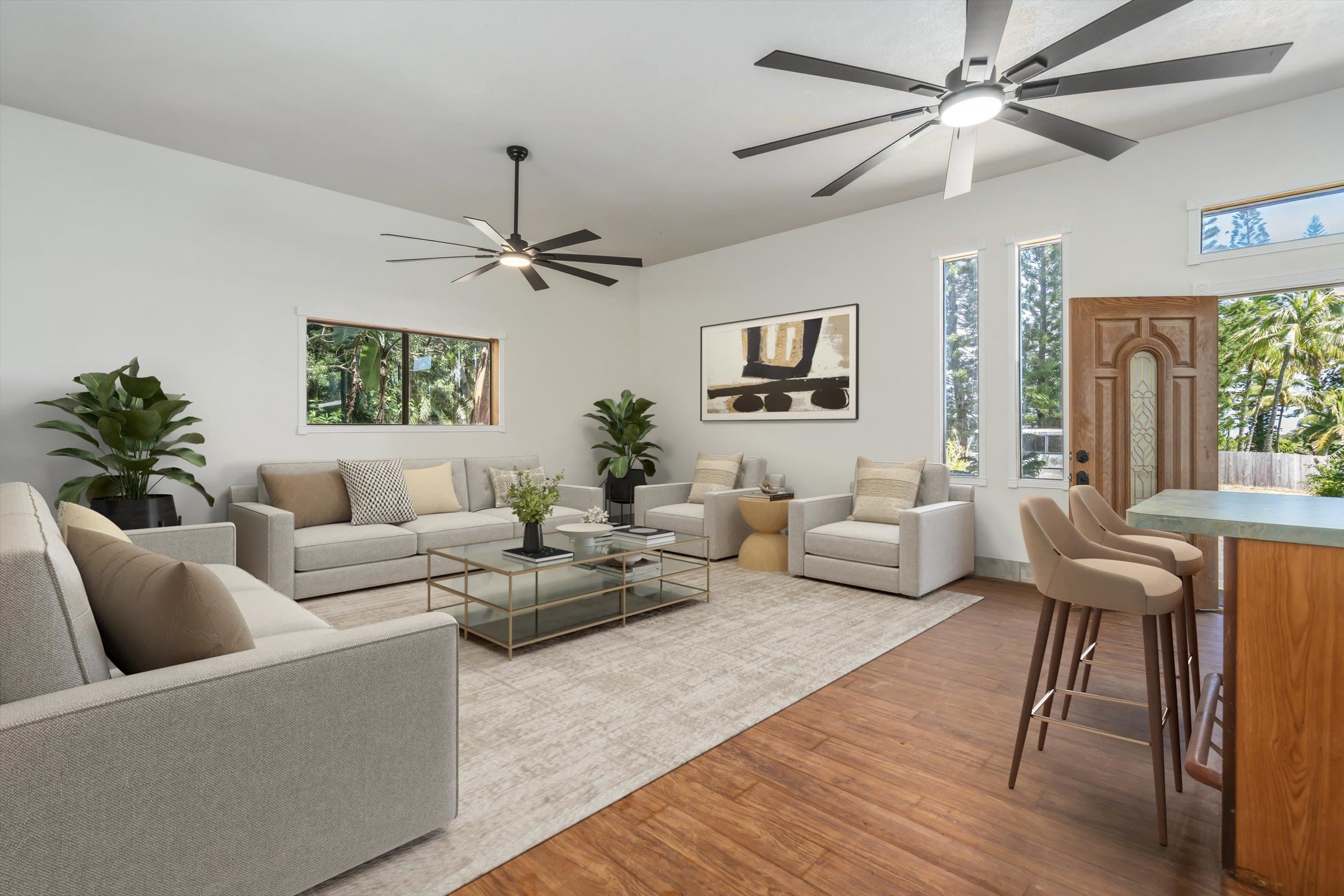 145 South Holokai Road Haiku, HI 96708 - Photo 10 of 50 a living room with furniture and a chandelier