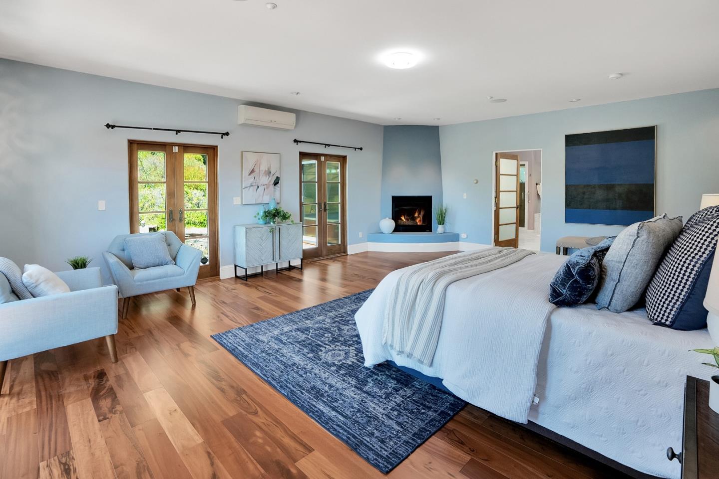 3030 Pleasant Valley Road Aptos, CA 95003 - Photo 25 of 70 a spacious bedroom with a bed a couch and a window