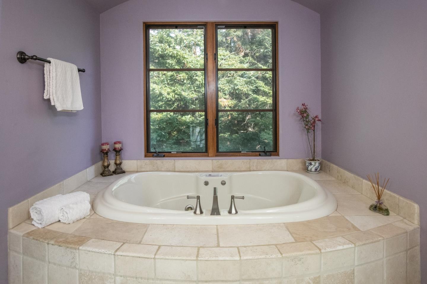 3030 Pleasant Valley Road Aptos, CA 95003 - Photo 30 of 70 a white bath tub sitting in a bathroom next to a window