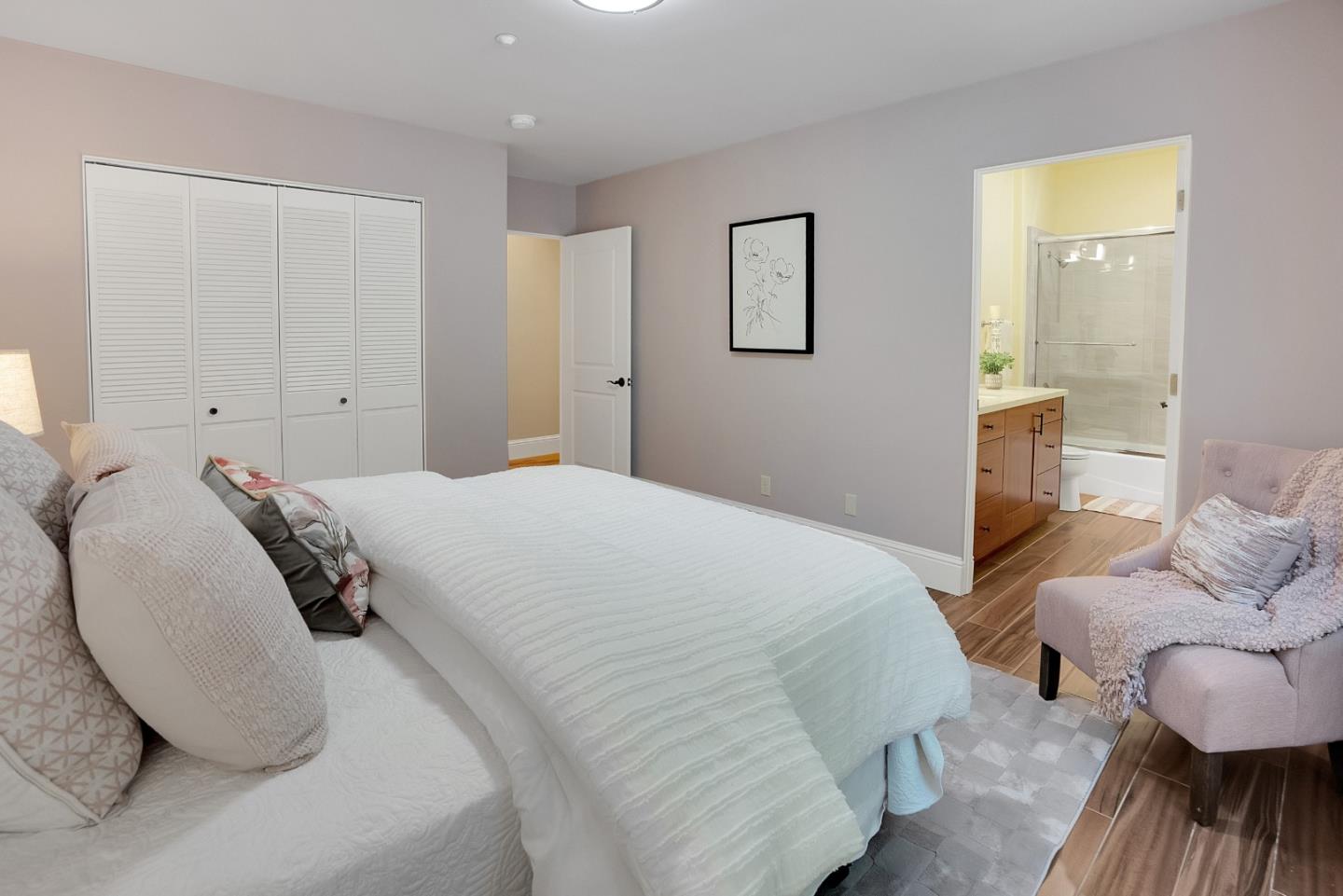 3030 Pleasant Valley Road Aptos, CA 95003 - Photo 42 of 70 a bedroom with bed and a night stand