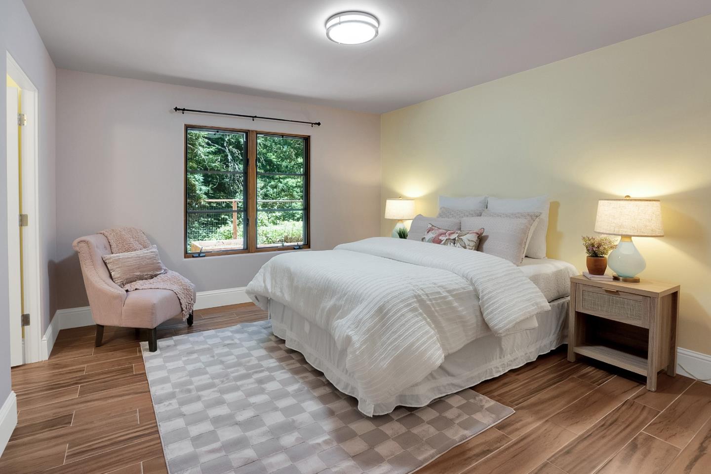 3030 Pleasant Valley Road Aptos, CA 95003 - Photo 43 of 70 a bedroom with a bed and a couch