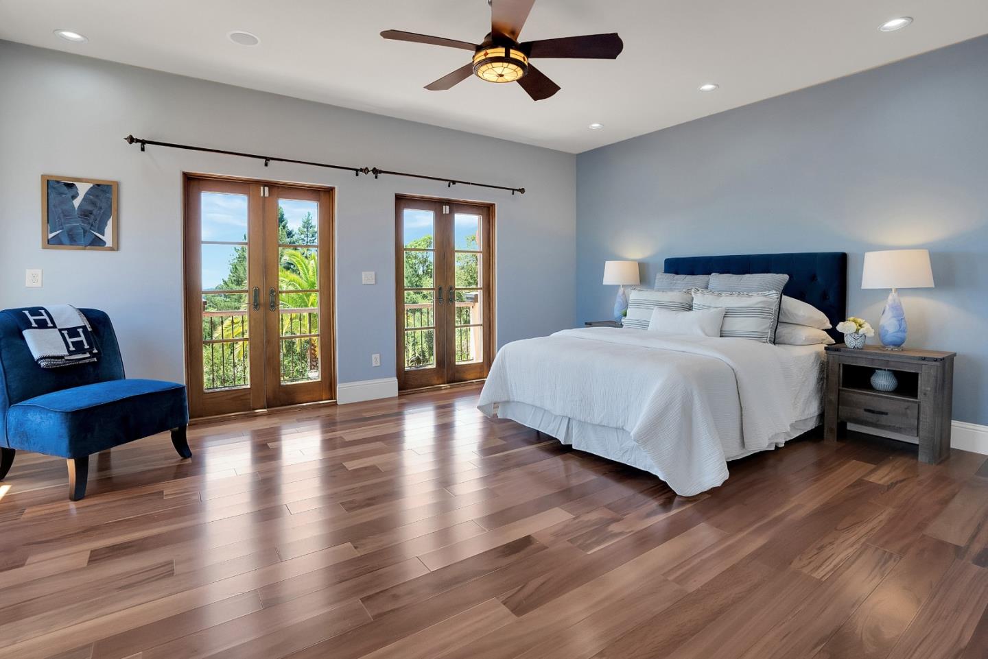 3030 Pleasant Valley Road Aptos, CA 95003 - Photo 45 of 70 a bedroom with a bed and wooden floor