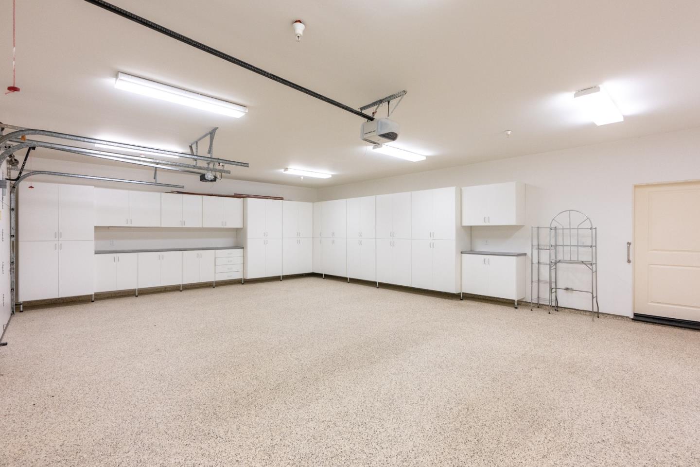 3030 Pleasant Valley Road Aptos, CA 95003 - Photo 55 of 70 an empty room with white cabinet and windows