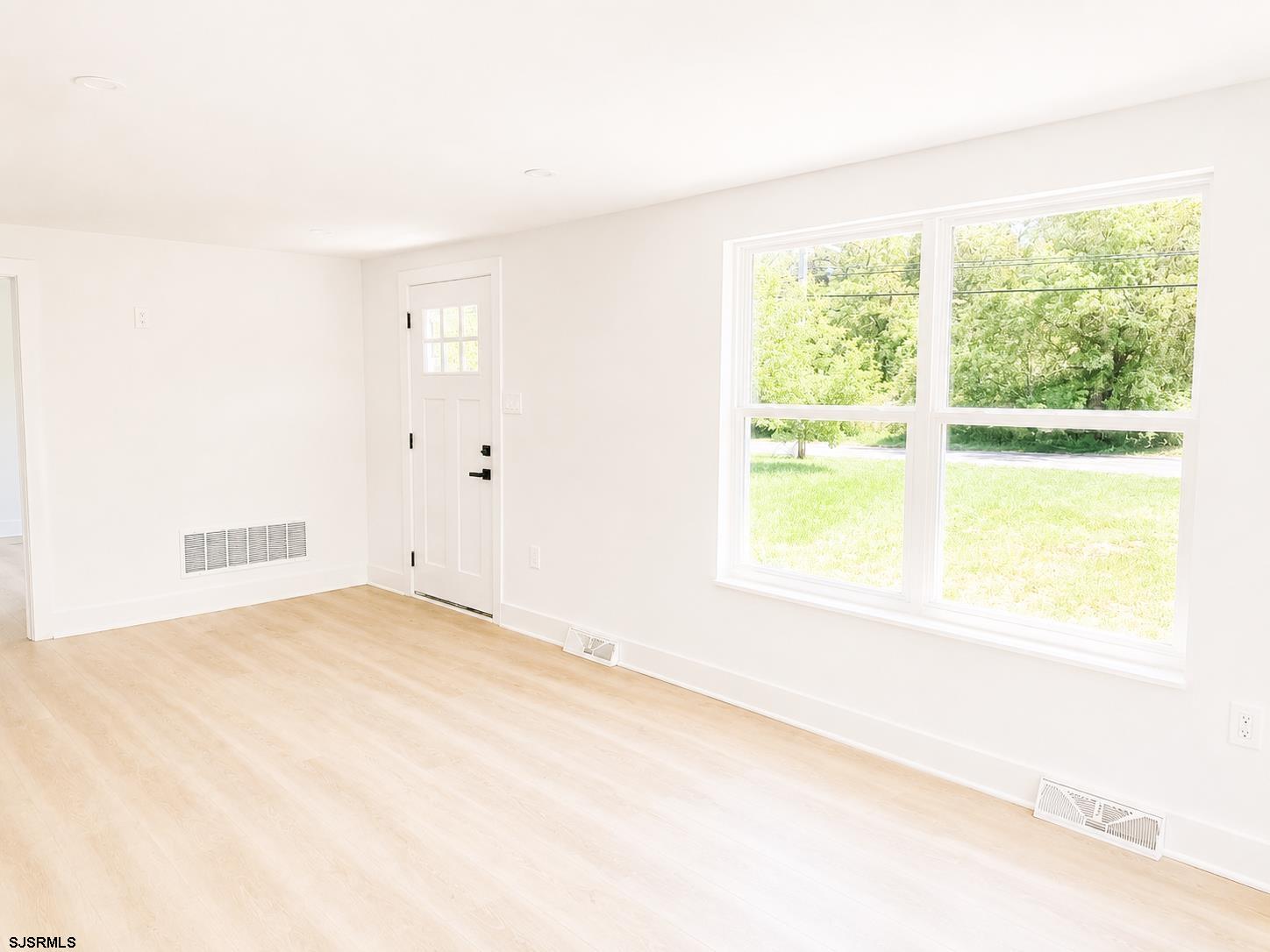 149 Old Port Republic Road Galloway Township, NJ 08205 - Photo 4 of 9 a view of an empty room with a window