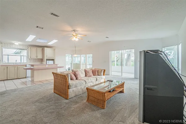 a living room with furniture and a table