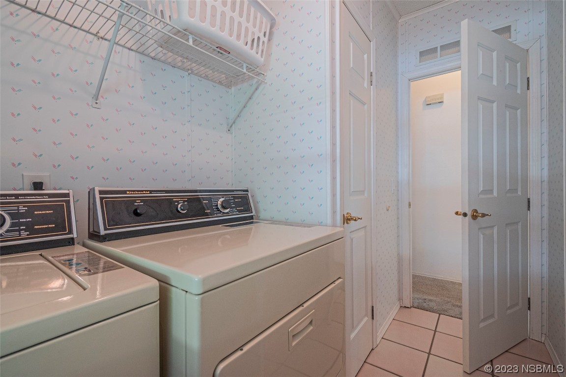 333 Schooner Avenue Edgewater, FL 32141 - Photo 15 of 31 a utility room with dryer and washer