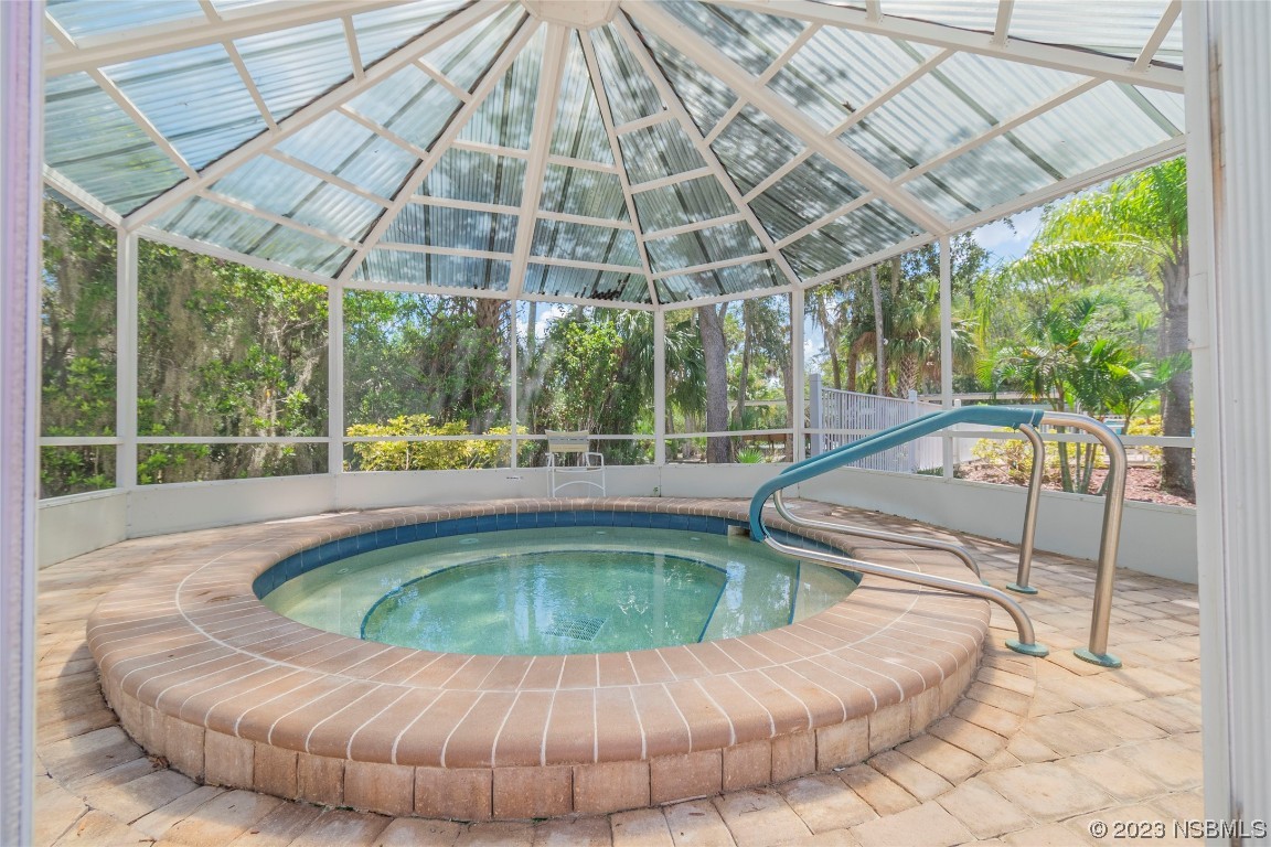 333 Schooner Avenue Edgewater, FL 32141 - Photo 26 of 31 a view of a swimming pool with a porch