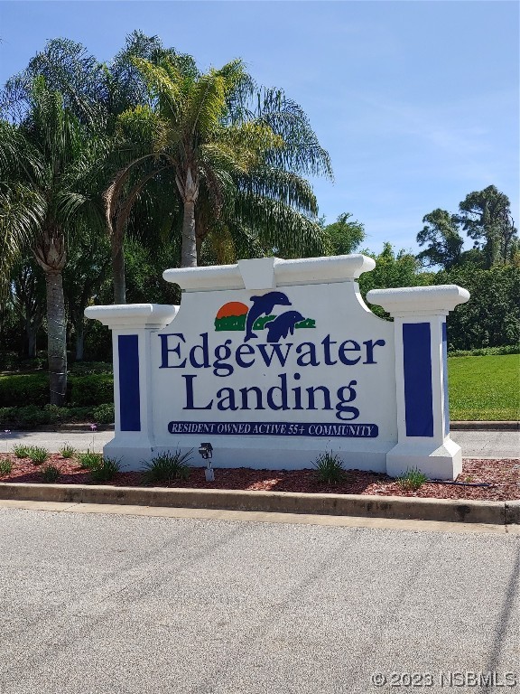 333 Schooner Avenue Edgewater, FL 32141 - Photo 28 of 31 a sign on the side of the road