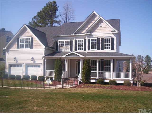204 Ivyshaw Road Cary, NC 27519 - Photo 1 of 12 Farmhouse front with wrap porch