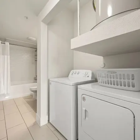 a utility room with dryer and washer