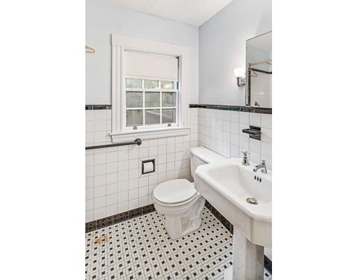95 Leland Road Boston, MA 02467 - Photo 11 of 20 a bathroom with a sink a toilet and shower