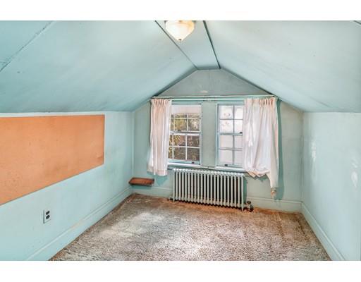 95 Leland Road Boston, MA 02467 - Photo 15 of 20 a living room with a large window