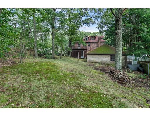 95 Leland Road Boston, MA 02467 - Photo 19 of 20 a view of a house with a backyard
