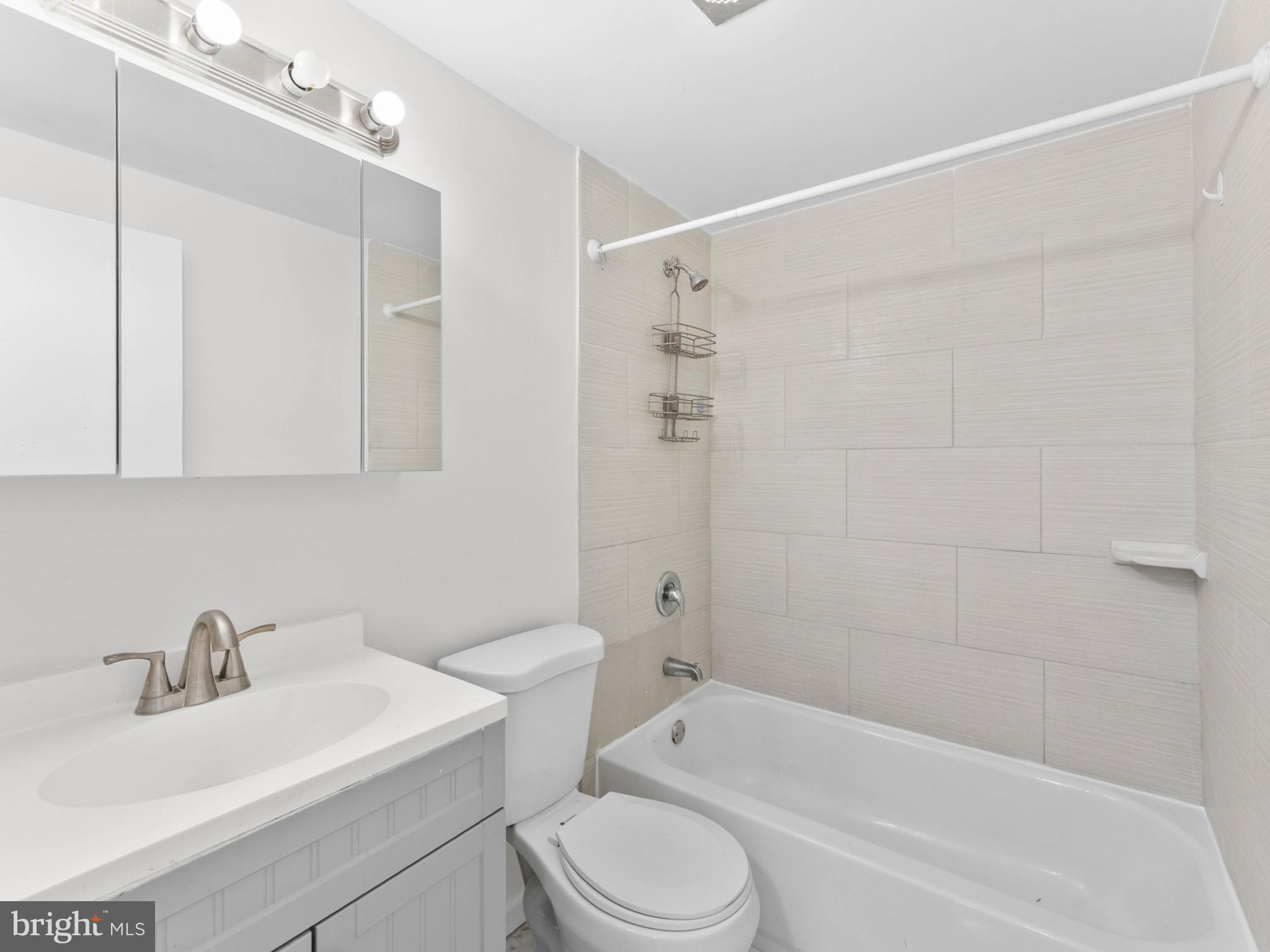 23 Roxborough Place Willingboro, NJ 08046 - Photo 14 of 23 a bathroom with a sink toilet and shower