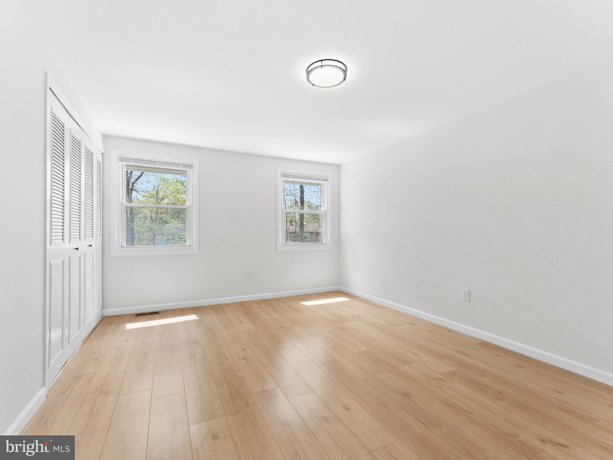 23 Roxborough Place Willingboro, NJ 08046 - Photo 15 of 23 an empty room with wooden floor and windows