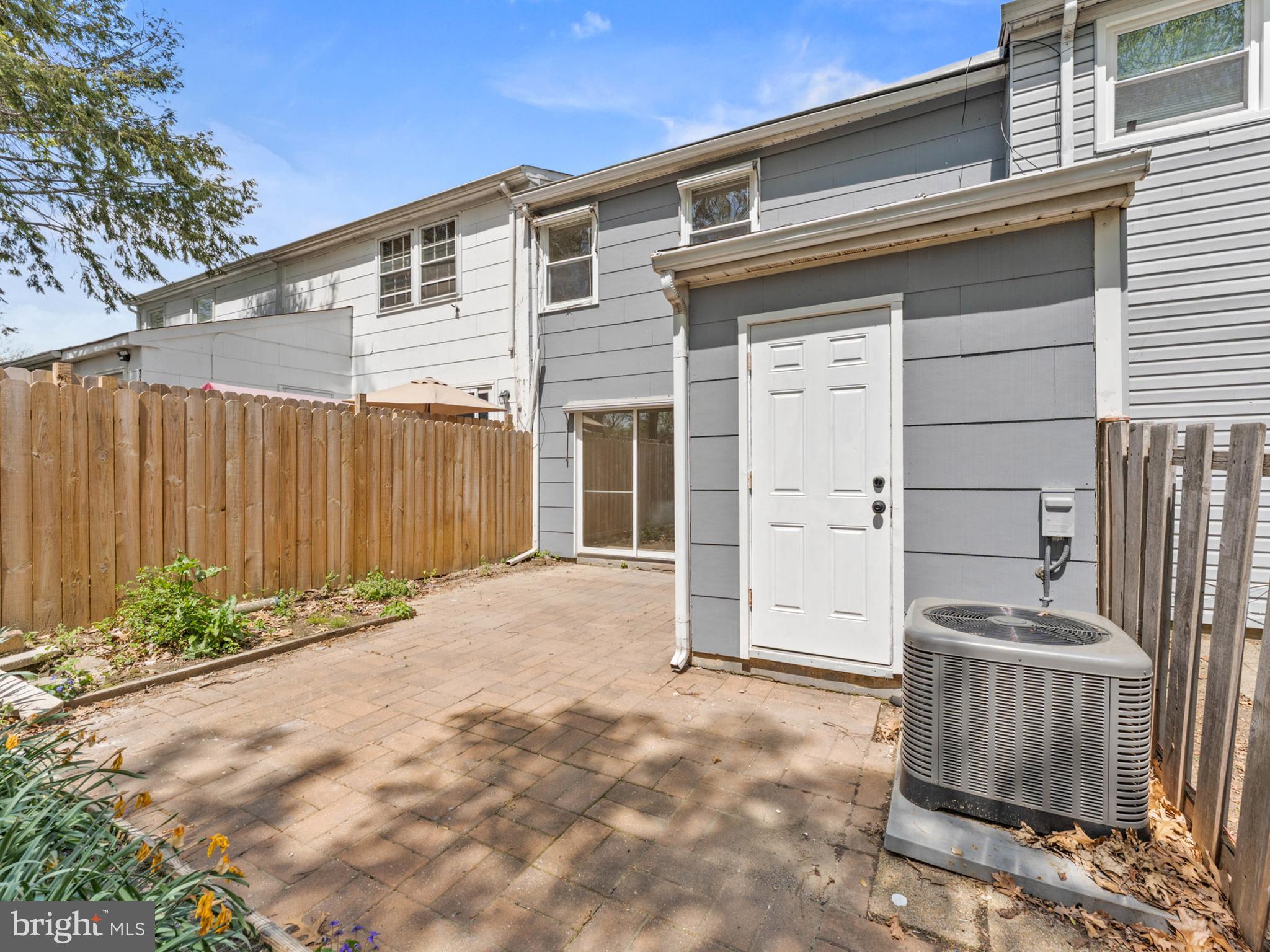 23 Roxborough Place Willingboro, NJ 08046 - Photo 23 of 23 a view of a house with backyard and wooden fence