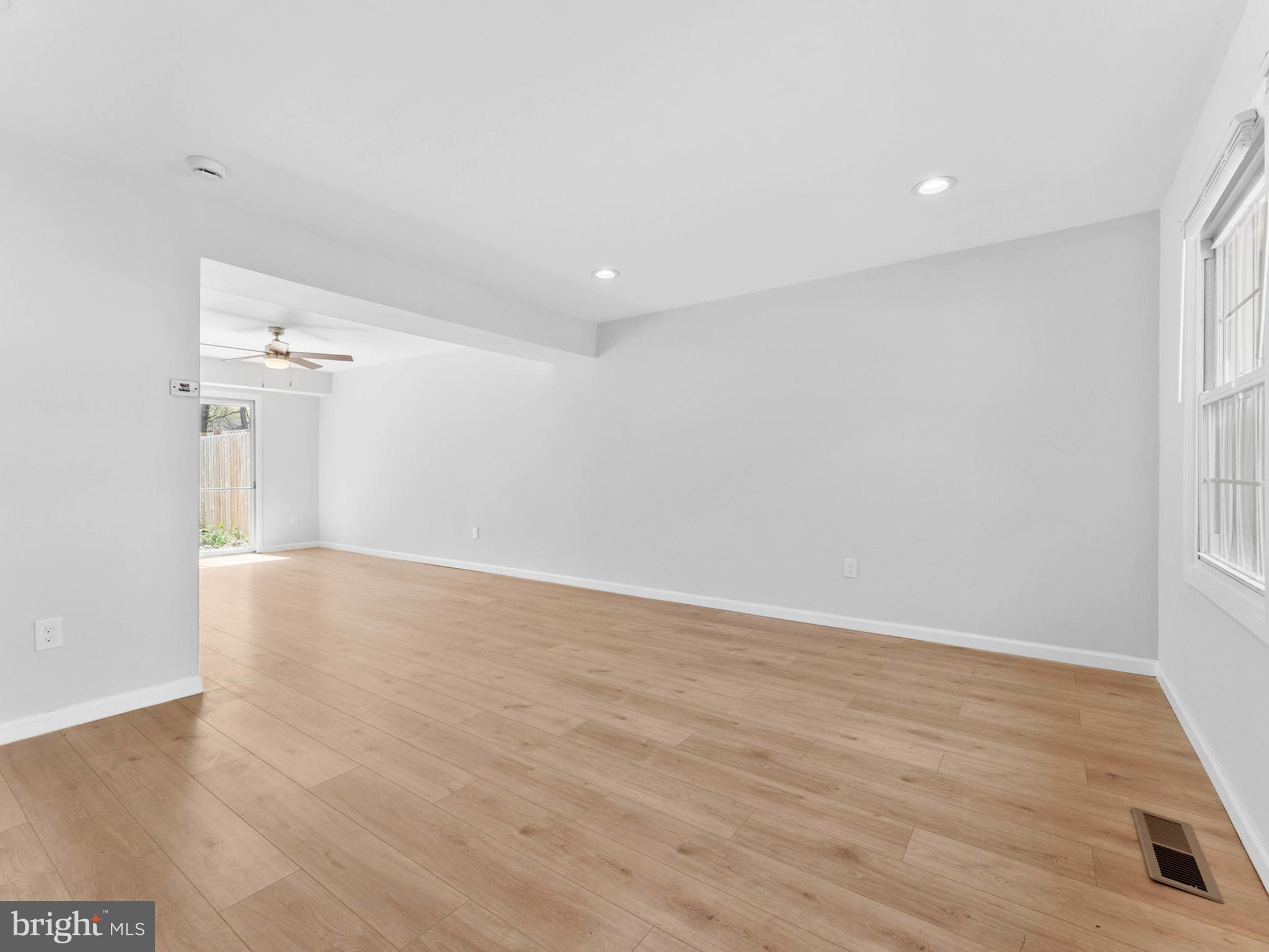 23 Roxborough Place Willingboro, NJ 08046 - Photo 3 of 23 a view of empty room with wooden floor and fan