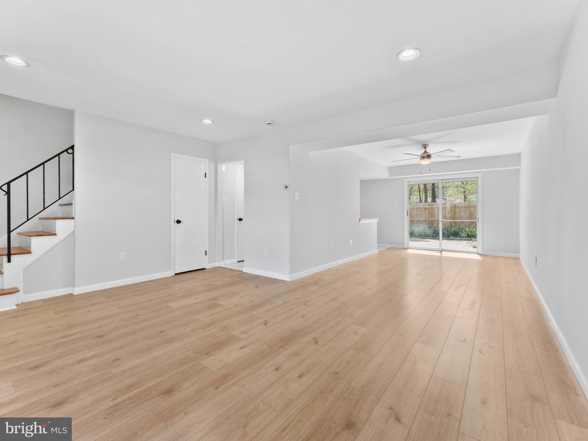 23 Roxborough Place Willingboro, NJ 08046 - Photo 4 of 23 a view of empty room with wooden floor and fan