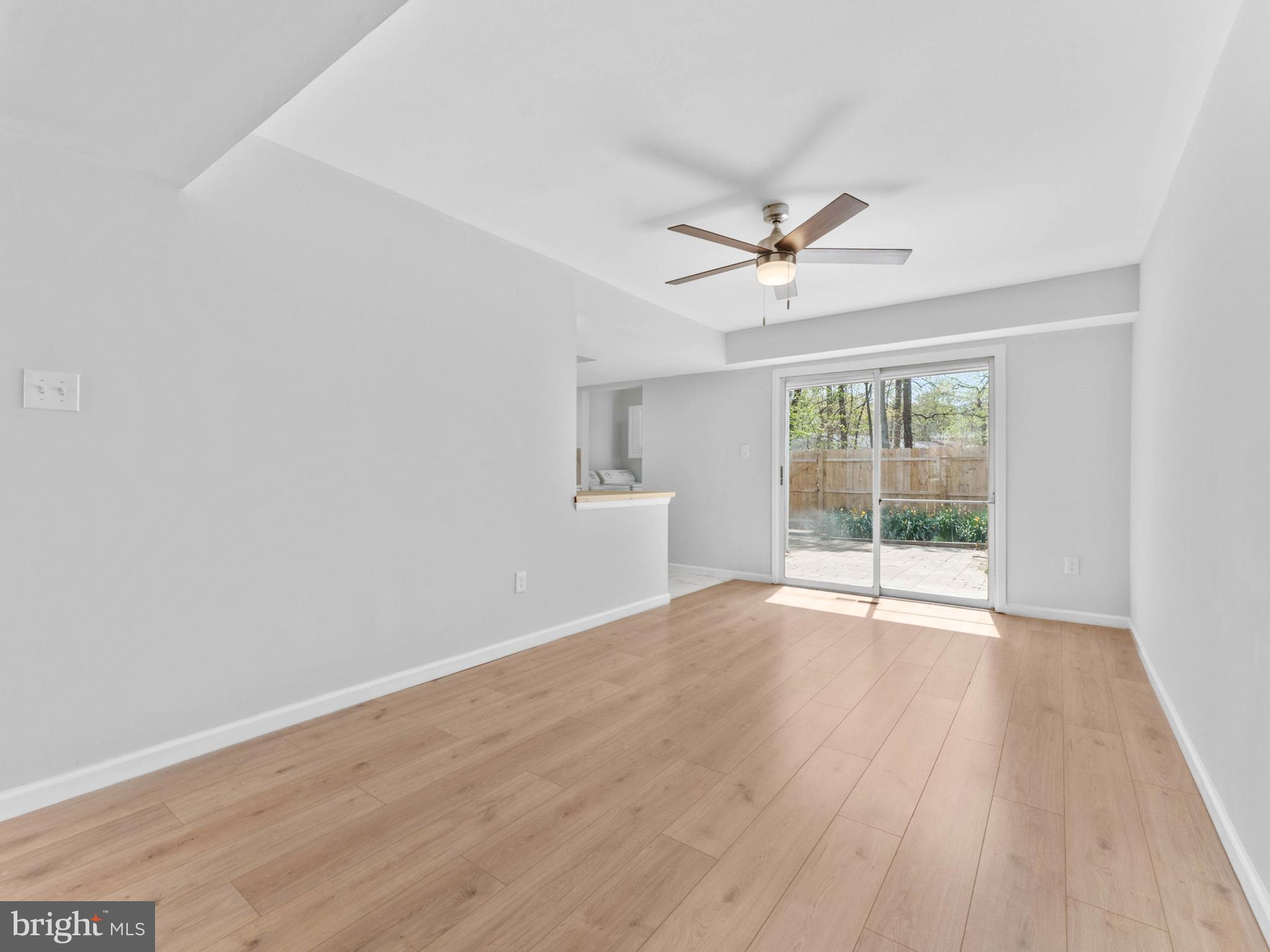 23 Roxborough Place Willingboro, NJ 08046 - Photo 6 of 23 wooden floor in an empty room with a window