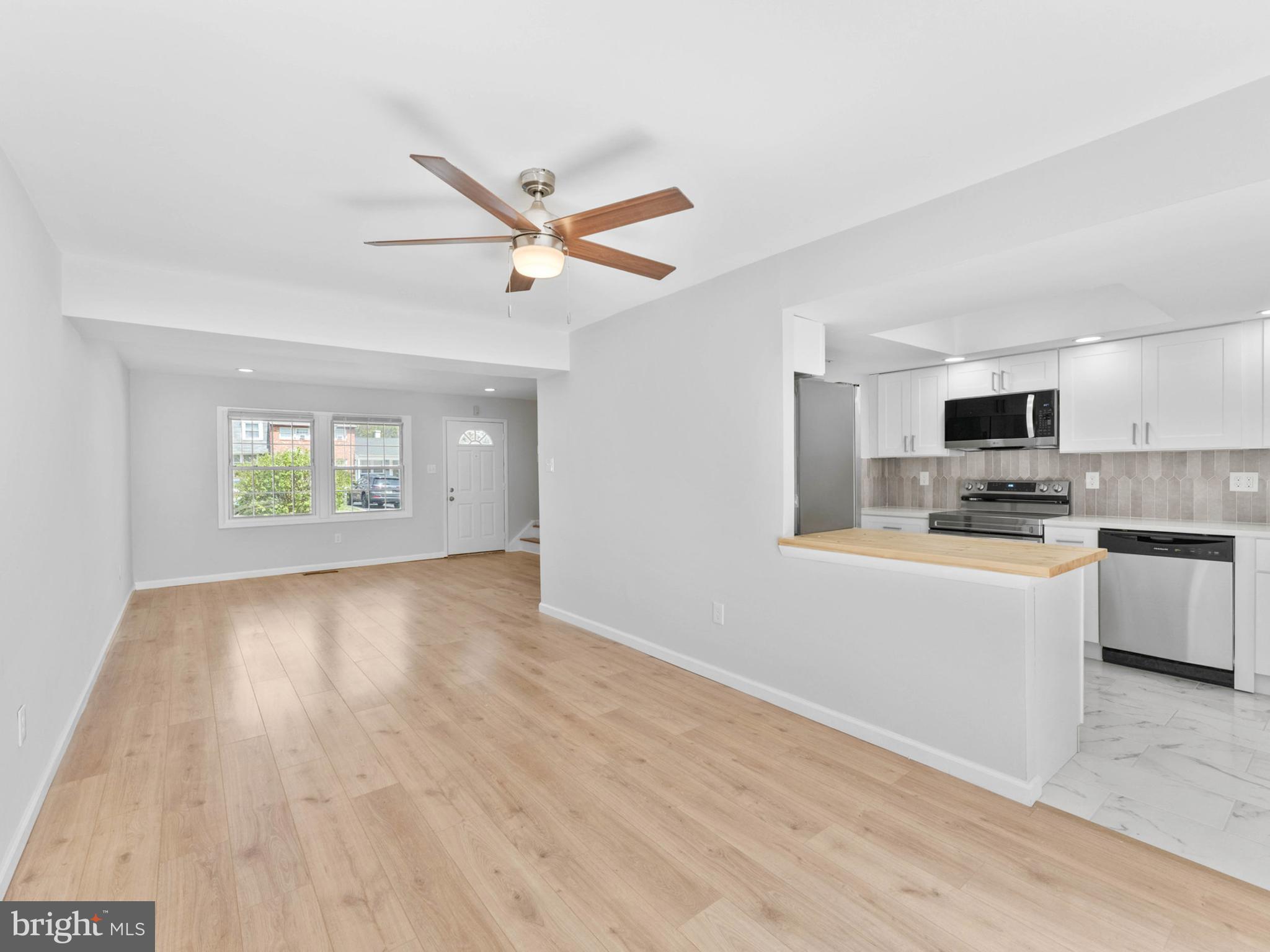 23 Roxborough Place Willingboro, NJ 08046 - Photo 7 of 23 a view of a kitchen with microwave and cabinets