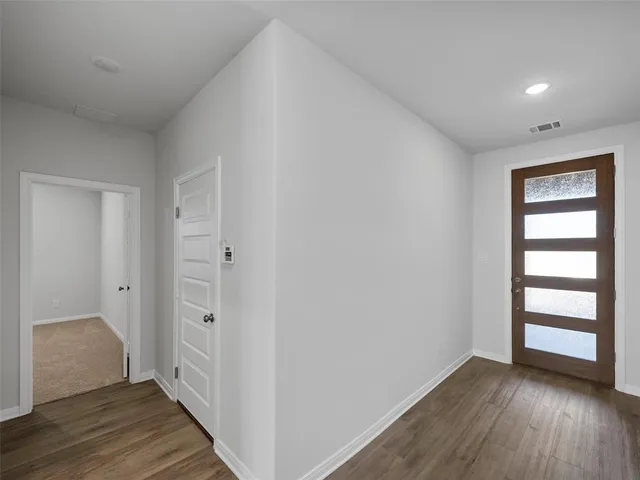 a house with yard in front of it