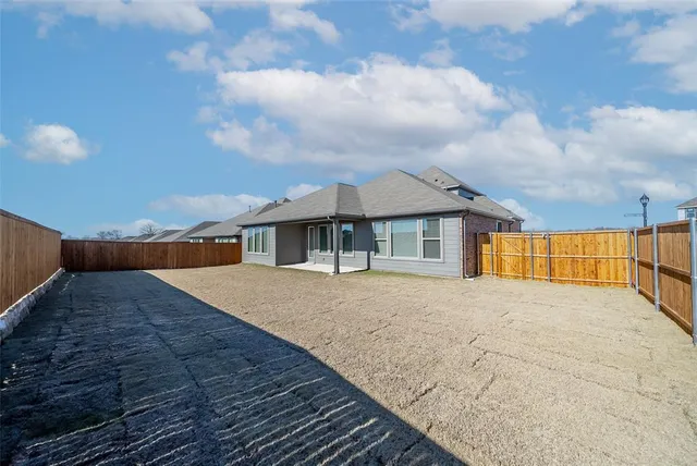 a front view of house with yard