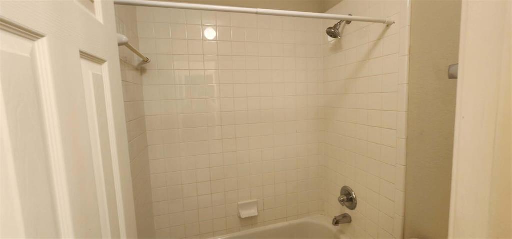 4204 Talbot Lane McKinney, TX 75070 - Photo 12 of 13 a bathroom with a shower