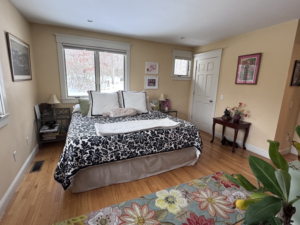 127 Preservation Way Tiverton, RI 02878 - Photo 19 of 41 a bedroom with a large bed and a window