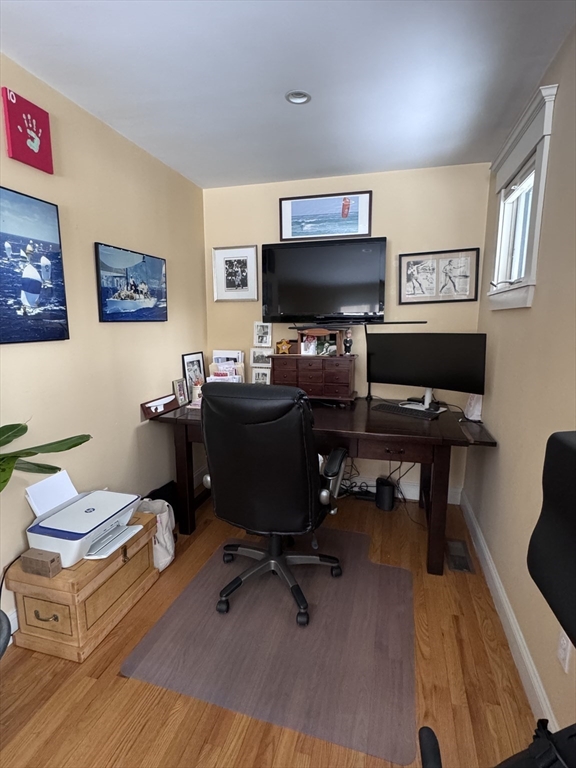 127 Preservation Way Tiverton, RI 02878 - Photo 21 of 41 a view of a livingroom with workspace and a couch
