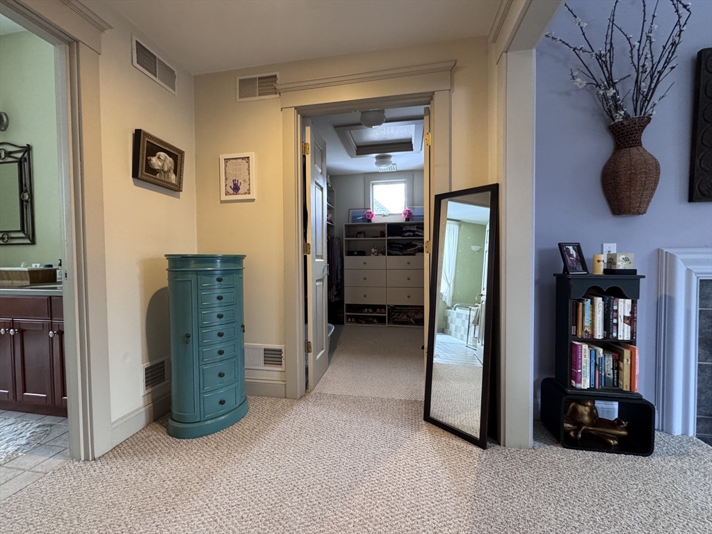 127 Preservation Way Tiverton, RI 02878 - Photo 26 of 41 a view of livingroom with furniture and closet