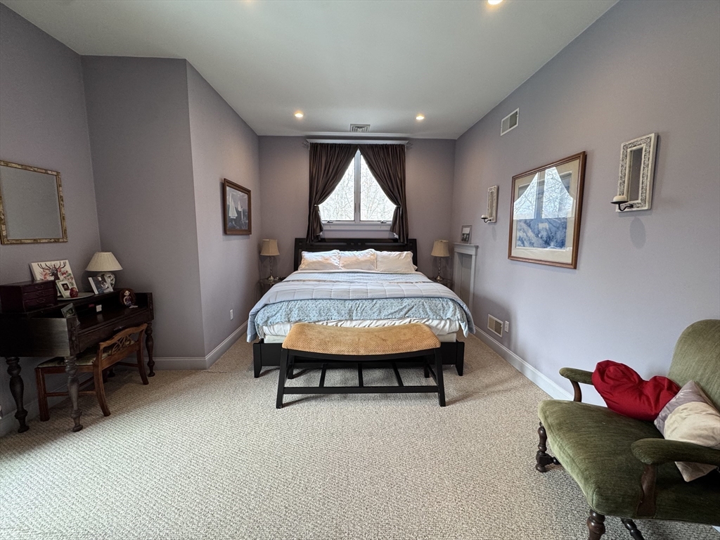 127 Preservation Way Tiverton, RI 02878 - Photo 27 of 41 a room with furniture and a bed