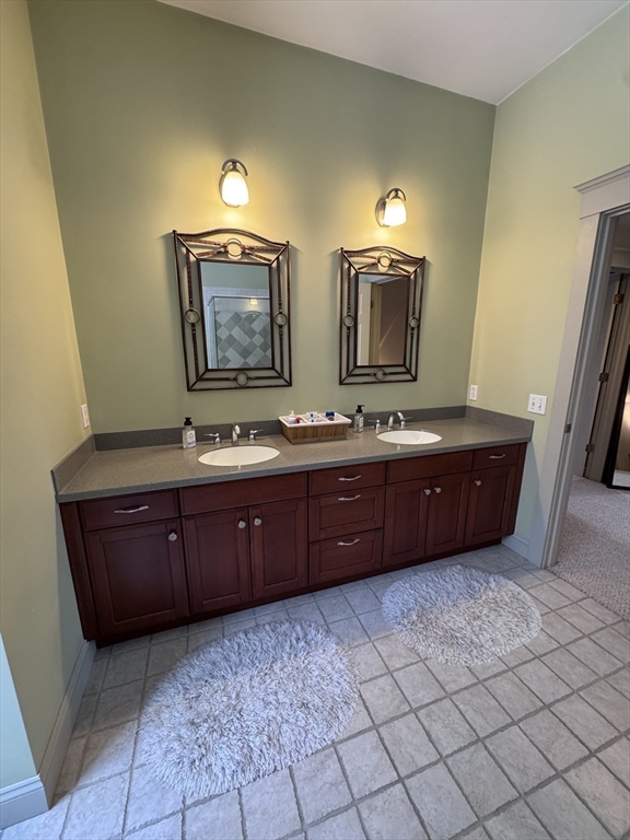 127 Preservation Way Tiverton, RI 02878 - Photo 33 of 41 a bathroom with a double vanity sink and mirror