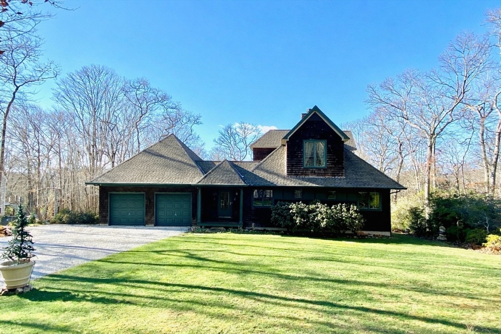 127 Preservation Way Tiverton, RI 02878 - Photo 39 of 41 a front view of a house with a garden