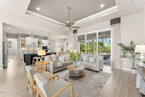 a kitchen with kitchen island granite countertop lots of counter top space and stainless steel appliances