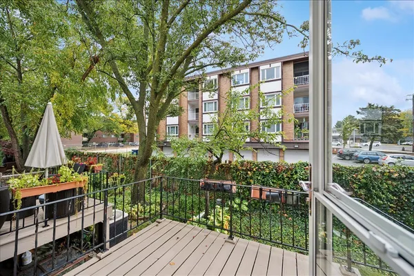 a view of a house with backyard from deck