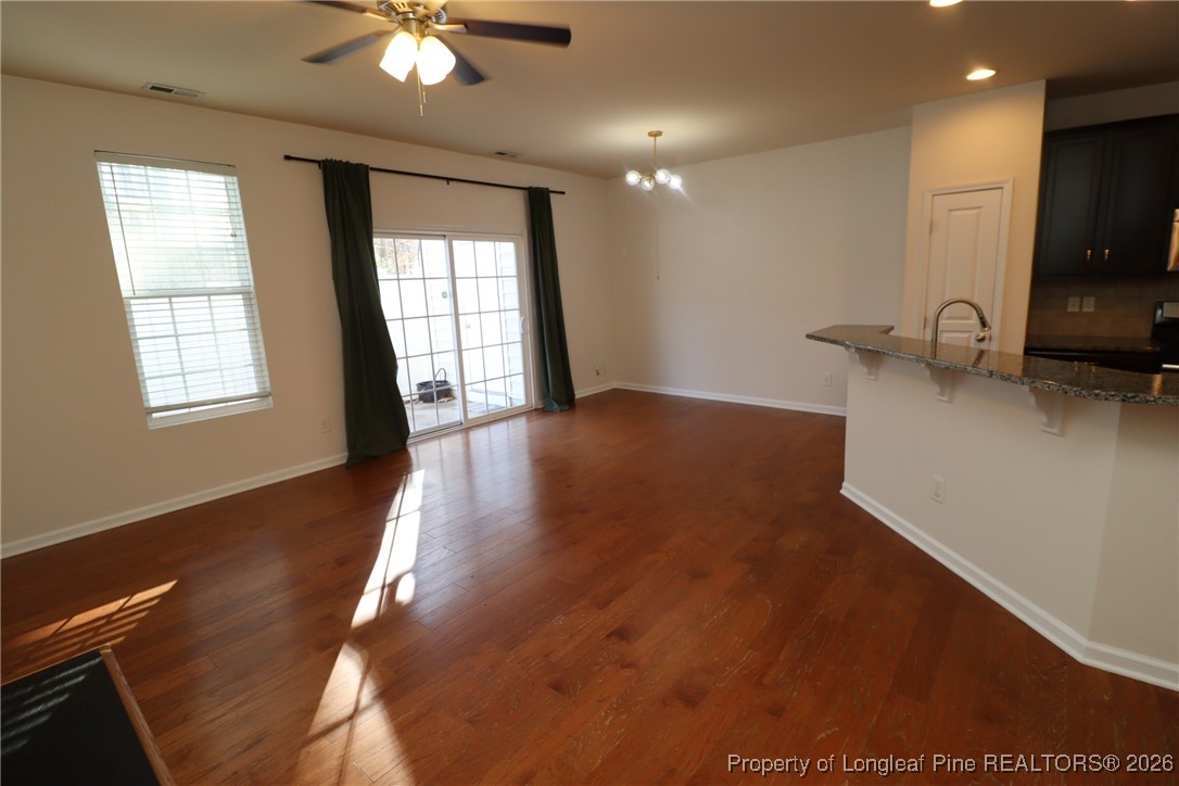 1712 Grace Point Road Morrisville, NC 27560 - Photo 19 of 35 a view of a livingroom with a ceiling fan and window