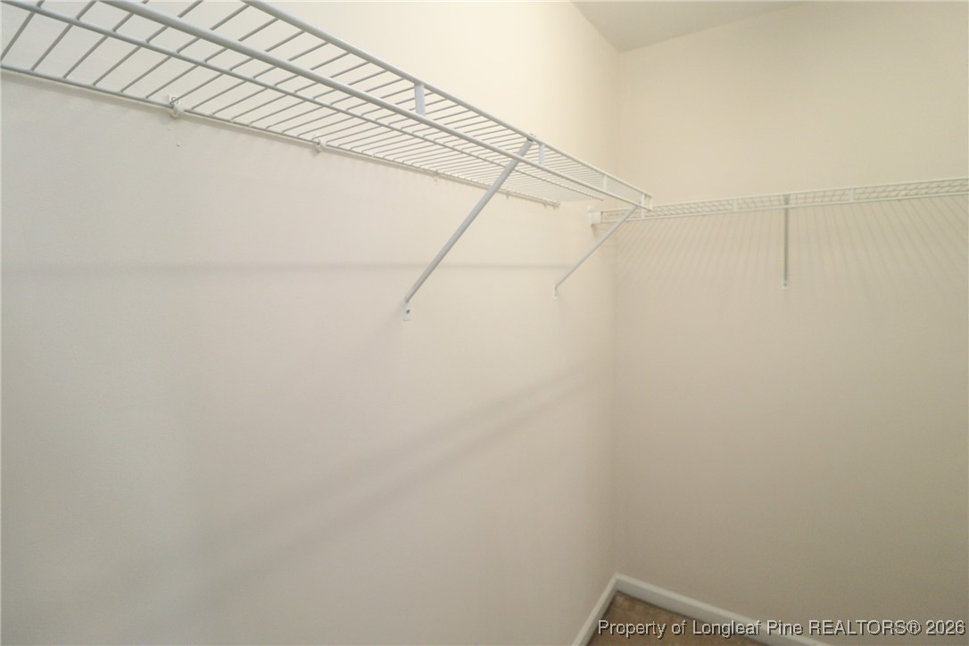 1712 Grace Point Road Morrisville, NC 27560 - Photo 27 of 35 a view of small space with racks on the wall