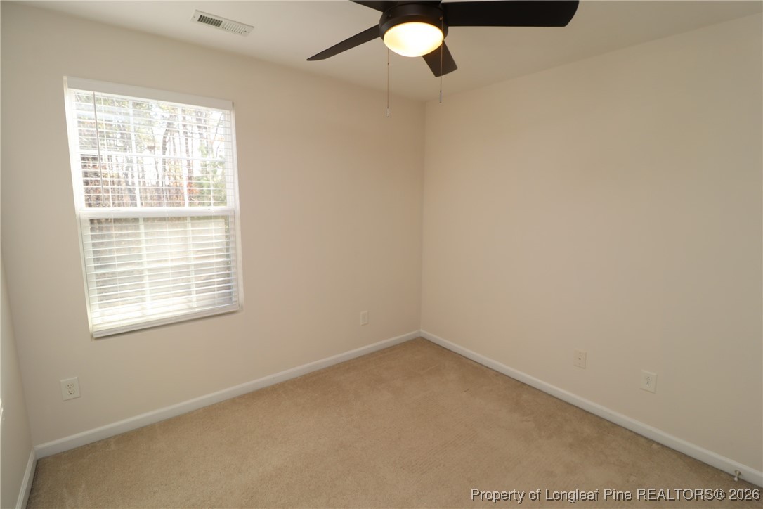 1712 Grace Point Road Morrisville, NC 27560 - Photo 33 of 35 an empty room with a window