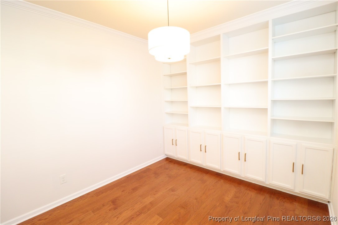 1712 Grace Point Road Morrisville, NC 27560 - Photo 9 of 35 a view of a small space with racks on the wall