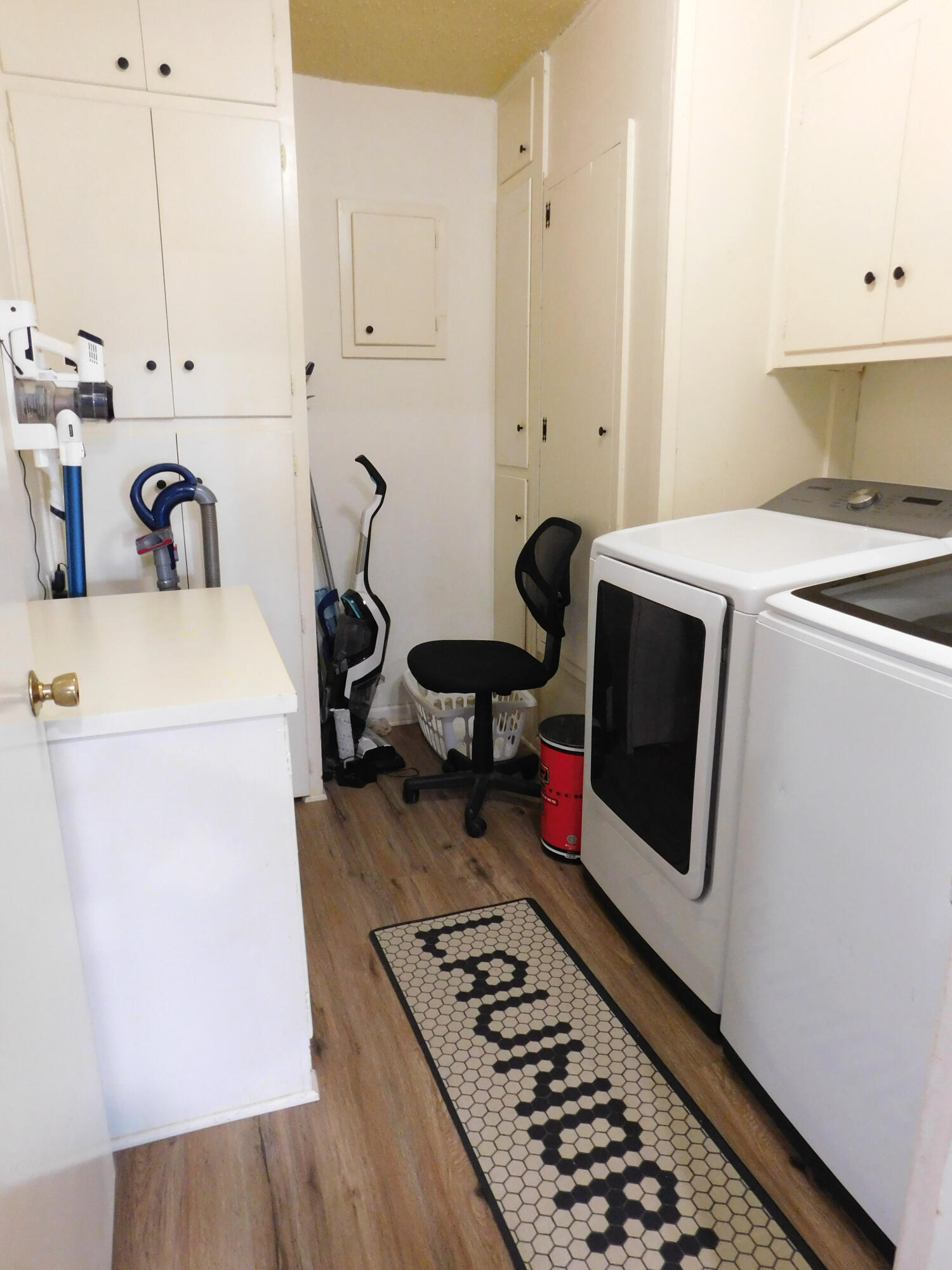 1730 West Ave F Muleshoe, TX 79347 - Photo 16 of 32 a room with storage and utility