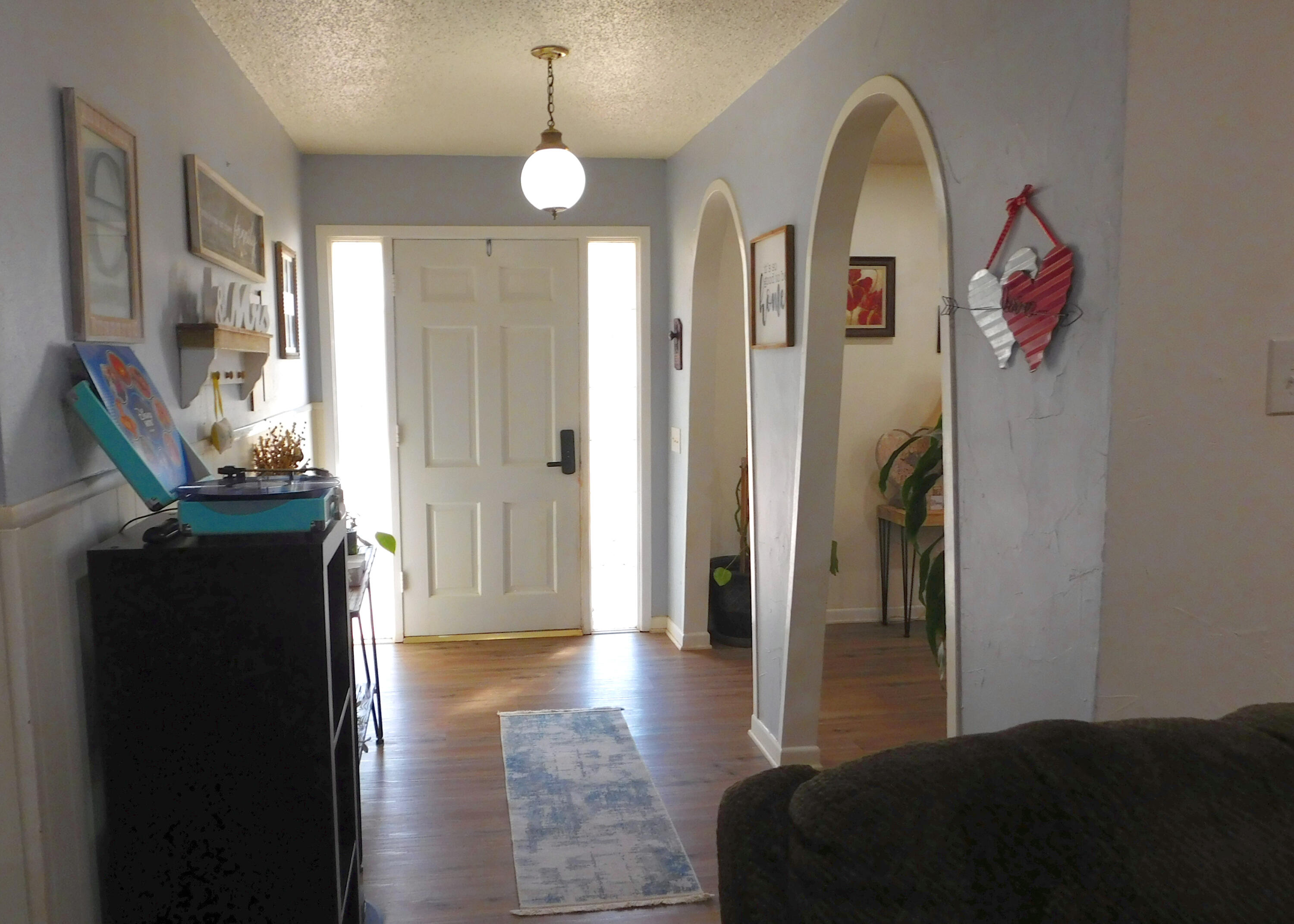 1730 West Ave F Muleshoe, TX 79347 - Photo 7 of 32 a view of livingroom with furniture and wooden floor