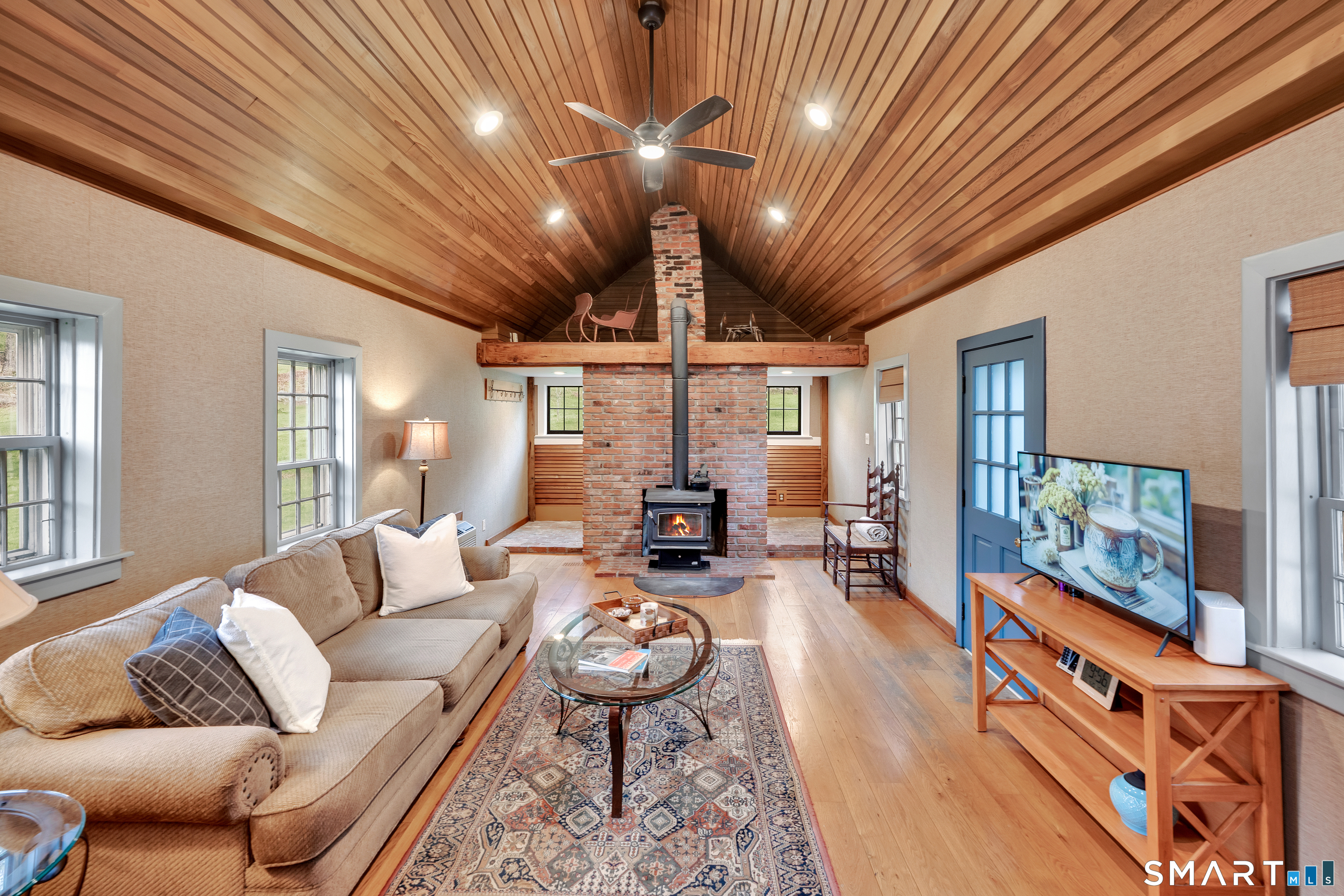 271 Cherry Brook Road Canton, CT 06019 - Photo 4 of 40 wood burning fireplace with wooden vaulted cellings