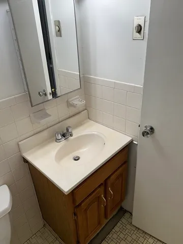 a bathroom with a sink and a toilet