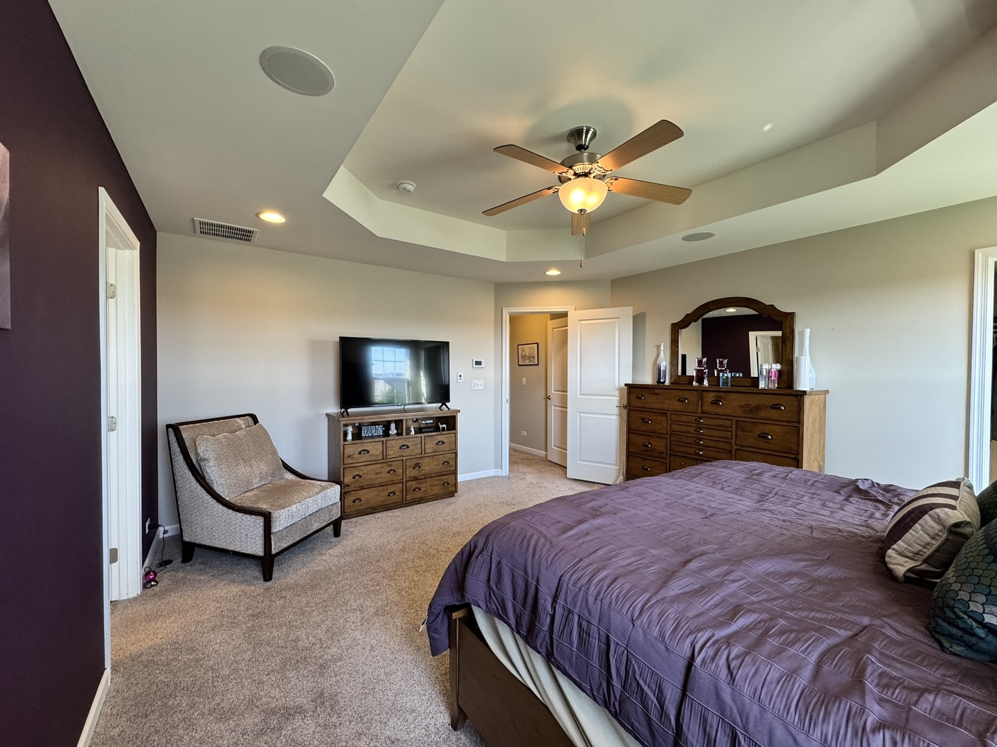12903 Cypress Lane Plainfield, IL 60585 - Photo 13 of 30 a bed room with a bed and a television